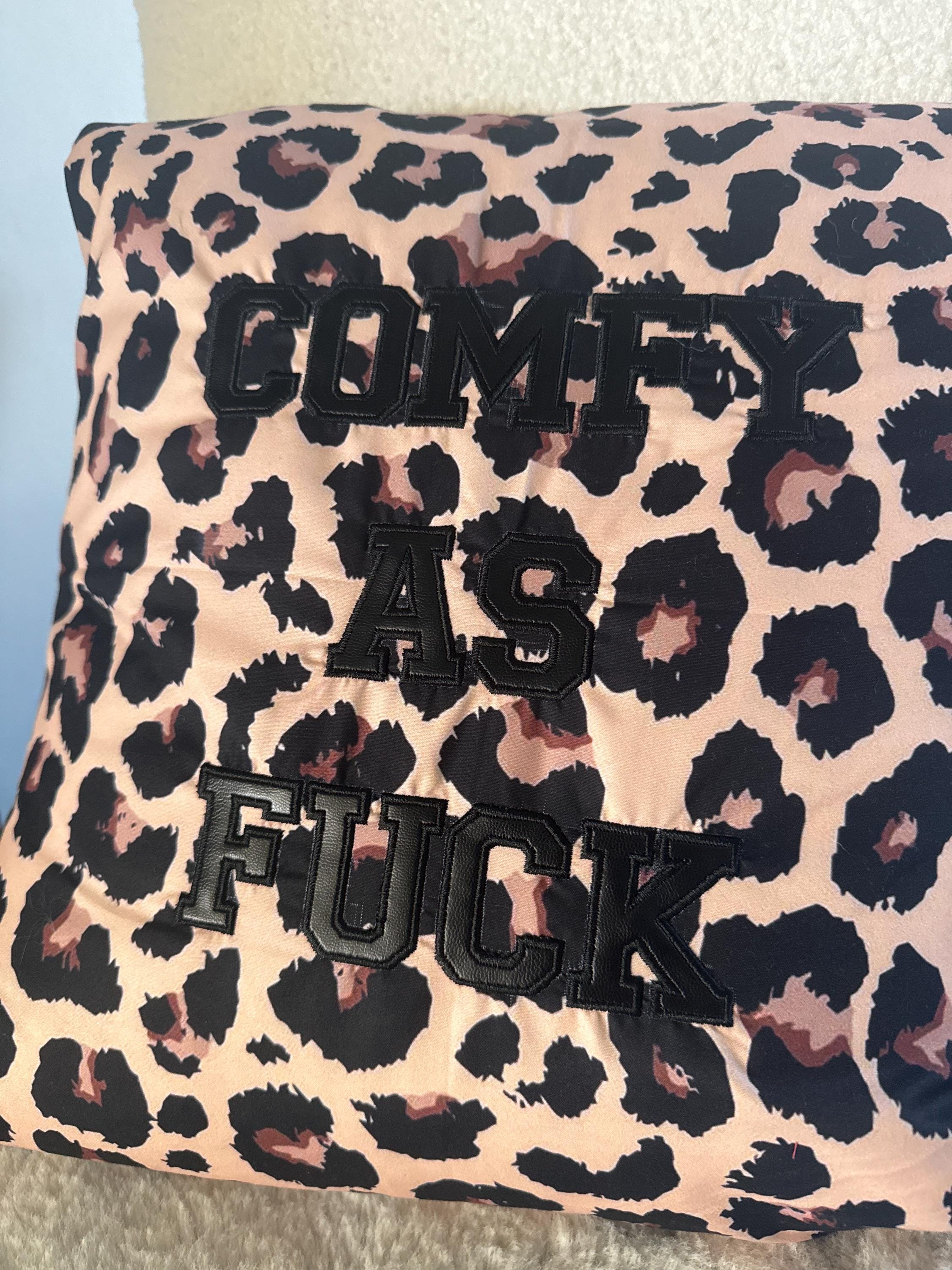 Leopard print cushion cover with ‘comfy as fuck’