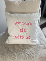 White cushion cover with pink mean girls quote