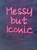 Black tote bag with ‘Messy but Iconic’ embroidered in neon pink